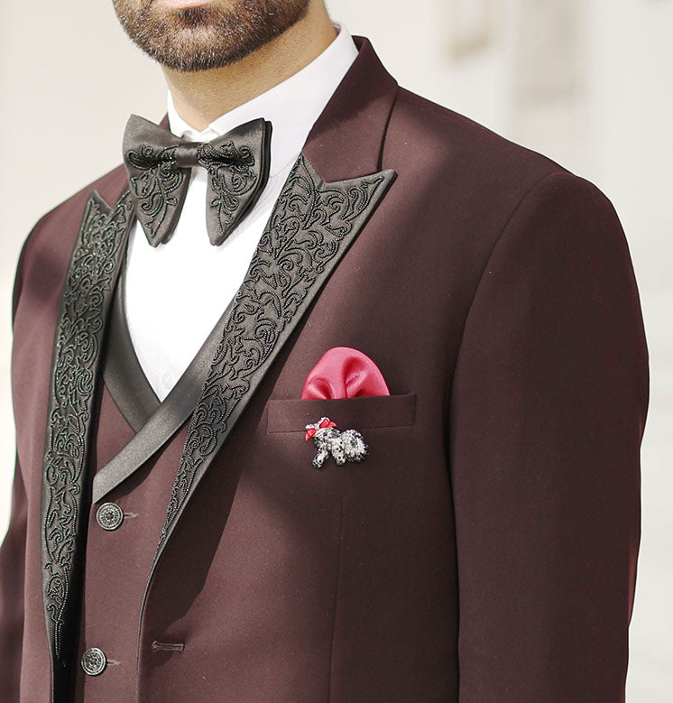 A stylish wine designer suit, perfect for weddings and formal occasions.
