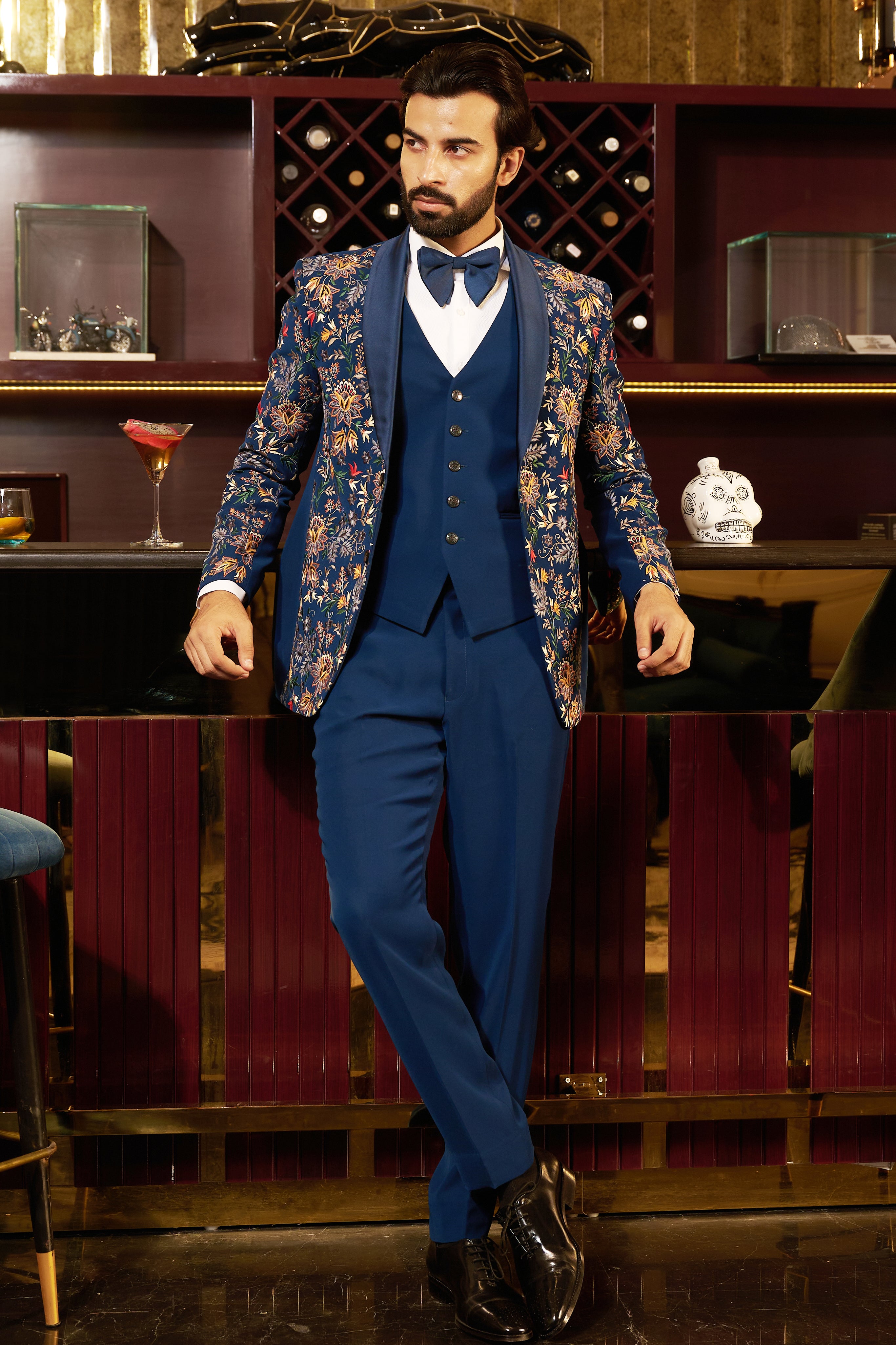 A luxurious teal fully embroidered suit, a timeless classic.
