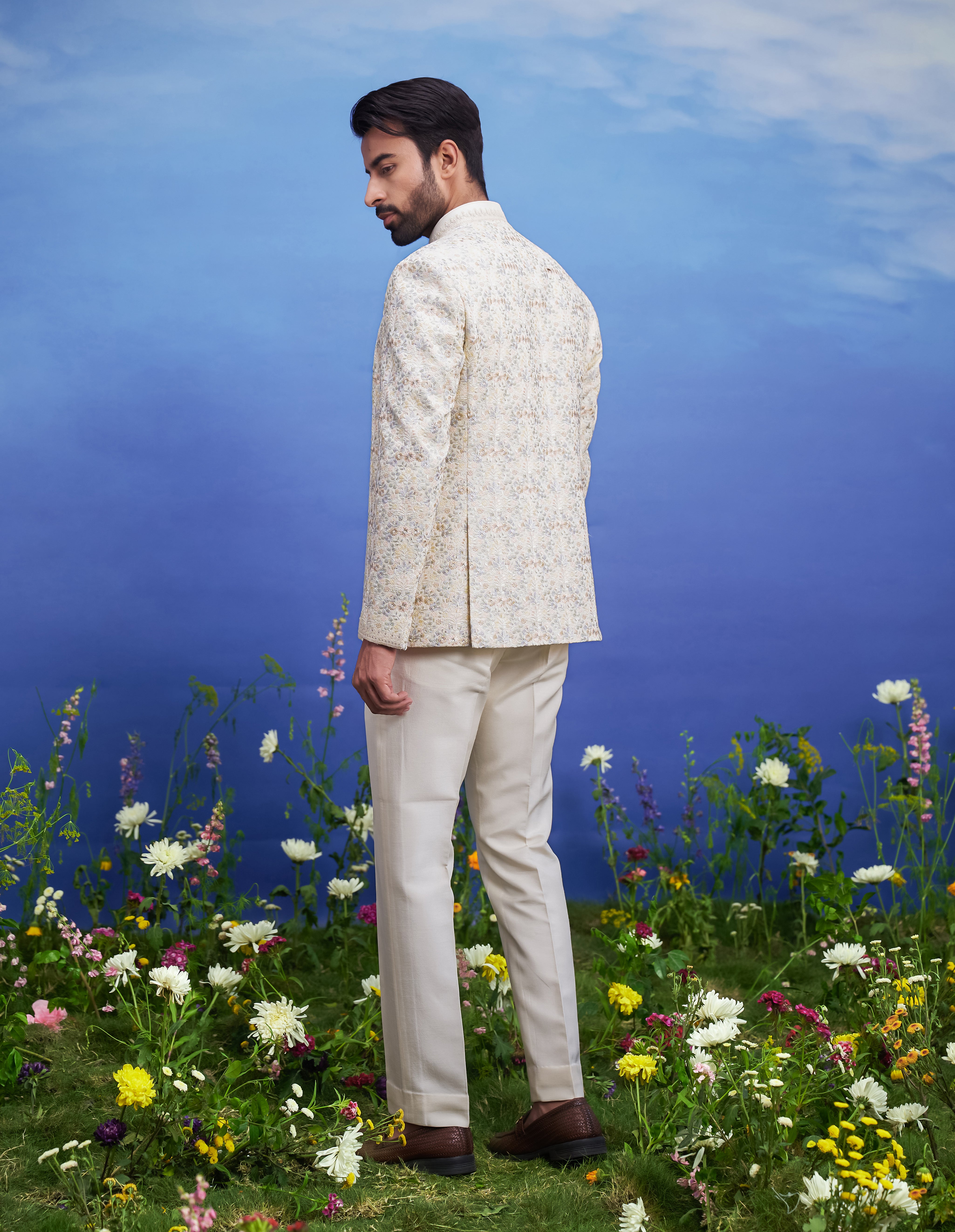 Men's beige thread embroidered open Bandhgala suit, presented as a complete outfit on a product page, designed for festive and wedding events.