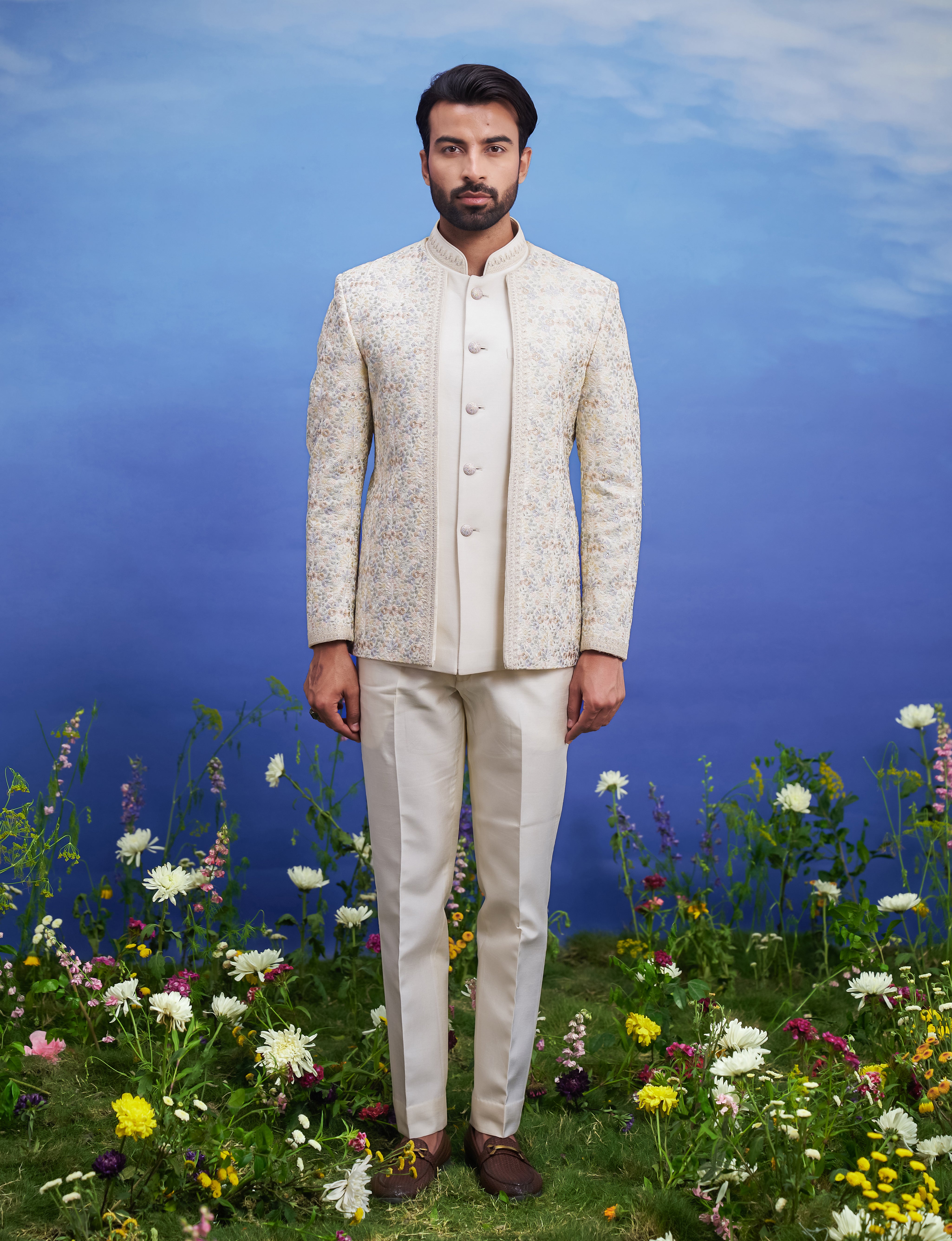 A detailed view of the beige thread embroidered open Bandhgala suit, showcasing the thread embroidery and open front design.