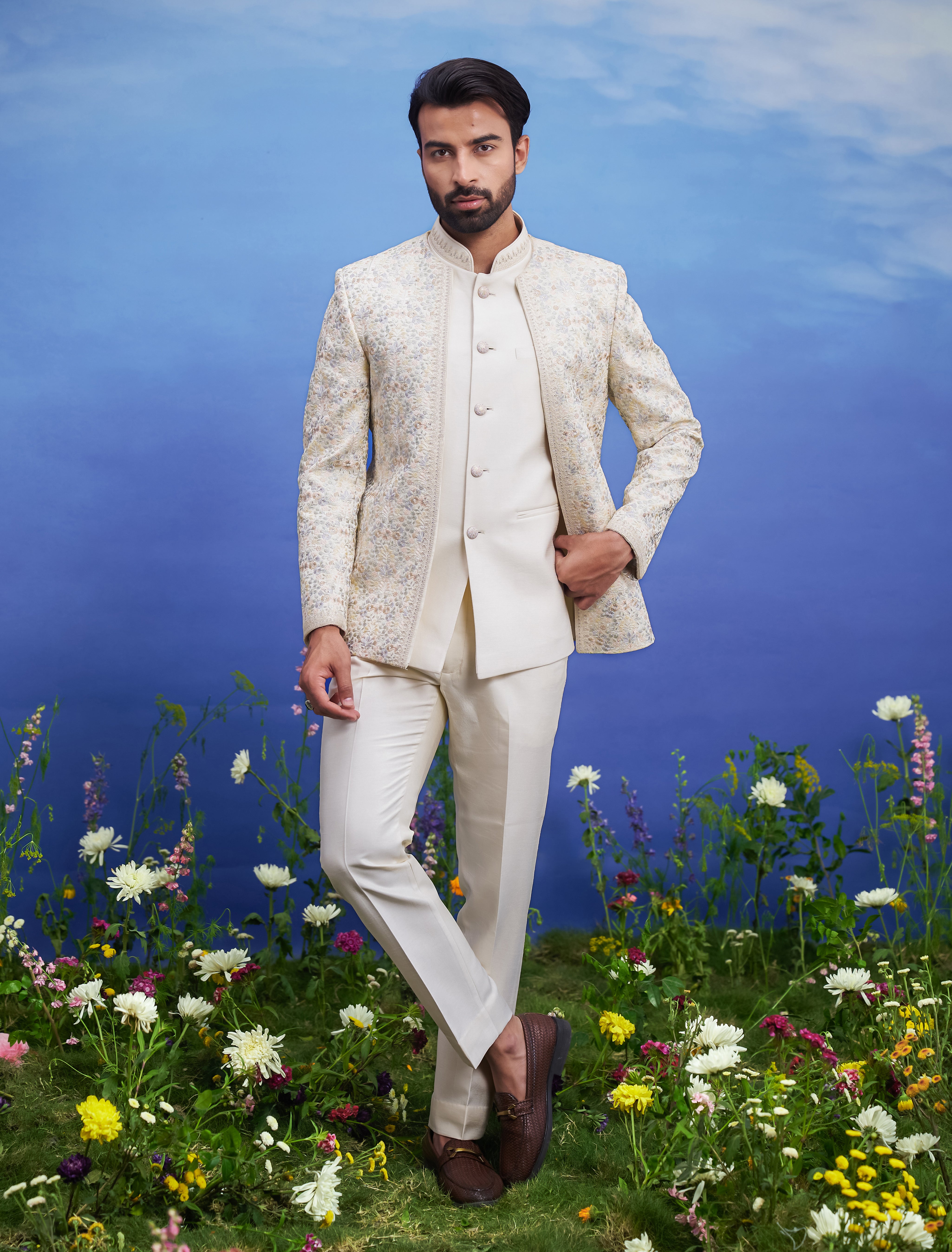 Beige thread embroidered open Bandhgala suit for men, blending traditional elegance with modern open front styling and intricate embroidery, suitable for weddings.