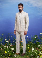 A sophisticated beige Bandhgala suit with thread embroidery and an open front, ideal for formal occasions.