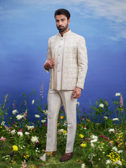 Beige thread embroidered open Bandhgala suit, men's ethnic formal wear, featuring a silk blend Bandhgala, sleeveless rayon jacket, trousers, and brooch.