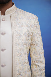 Close-up of the beige thread embroidered open Bandhgala suit, highlighting the thread embroidery and fabric texture.