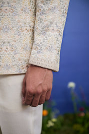 Men's beige Bandhgala attire with thread embroidery, suitable for weddings and festivals, available in sizes 36 to 44 and custom.