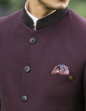 A Timeless Classic
Stylish Wine Textured Bandhgala with Intricate Crystal Work