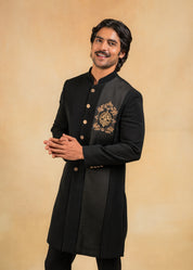 black indo-western with brooch and pintuck