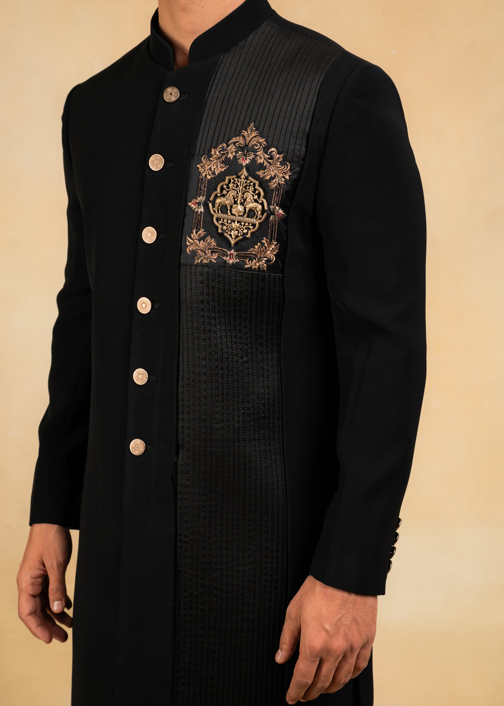 black indo-western with brooch and pintuck