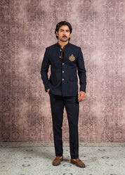 blue bandhgala with handcrafted lion brooch