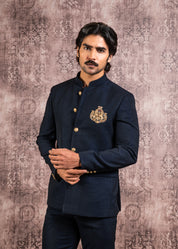 blue bandhgala with handcrafted lion brooch