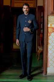 blue bandhgala with handcrafted lion brooch