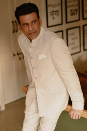 Cream hand embroidered designer bandhgala suit with pearl collar detailing and matching trousers